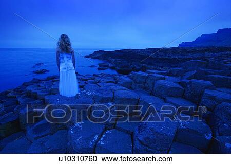 Stock Image - Woman Looking at Sea. Fotosearch