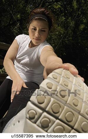 Woman stretching View Large Photo Image Stock Photography - Woman stretching. Fotosearch