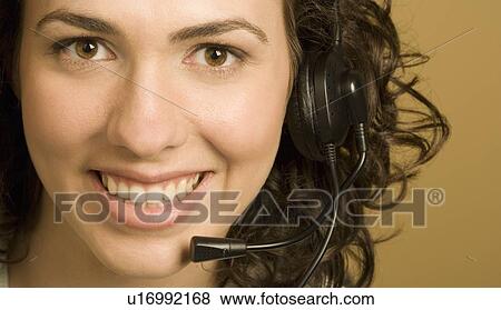 Stock Photo - Woman with Headset. Fotosearch