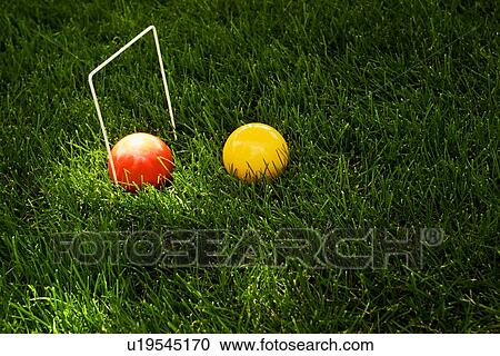 Stock Image - A croquet game. Fotosearch