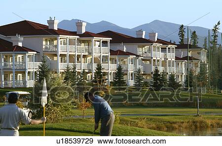 Stock Photo - A beautiful golf course. Fotosearch