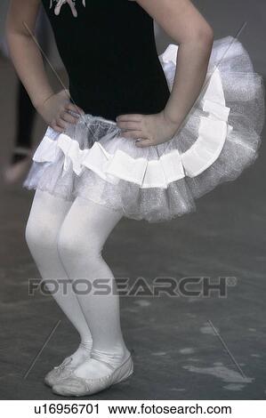 Stock Image - A child practices ballet. Fotosearch