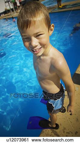 Stock Image - A child ready to go swimming. Fotosearch