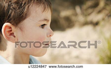 Stock Photo - A child's expression. Fotosearch
