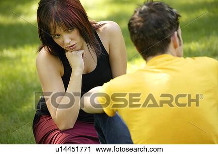 Stock Image - A couple has a serious talk. Fotosearch
