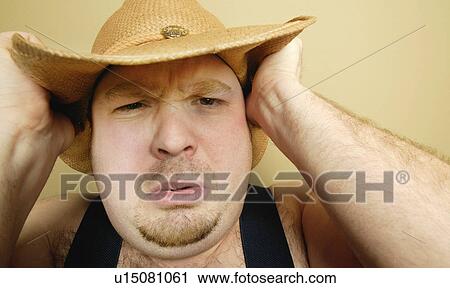 Stock Image - A cowboy's expression. Fotosearch