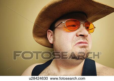 Stock Image - A cowboy's expression. Fotosearch