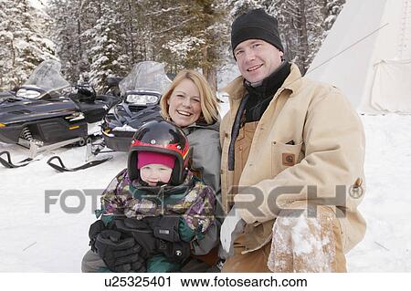 A family with ski-doos View Large Photo Image Stock Image - A family with ski-doos. Fotosearch