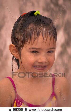 Stock Photograph - A girl with wet hair. Fotosearch