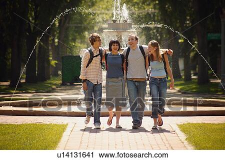 A group of students walk View Large Photo Image Stock Image - A group of students walk. Fotosearch