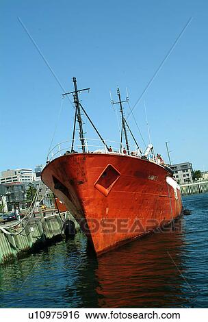 Stock Photograph - A large ship in harbor. Fotosearch