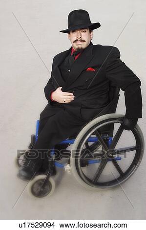 A man in a wheelchair View Large Photo Image Picture - A man in a wheelchair. Fotosearch