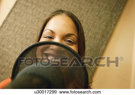 Stock Photo - A recording artist. Fotosearch