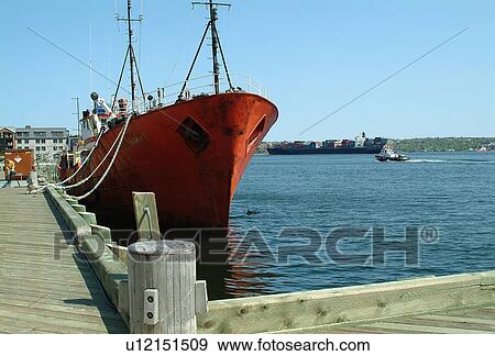 A red tug boat View Large Photo Image Stock Photo - A red tug boat. Fotosearch