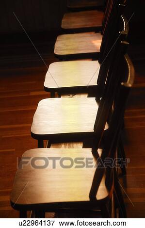 A row of chairs View Large Photo Image Stock Photo - A row of chairs. Fotosearch