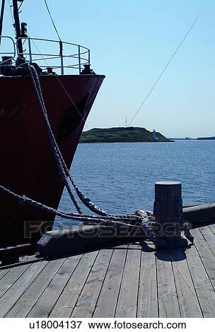 Stock Photo - A ship docked. Fotosearch