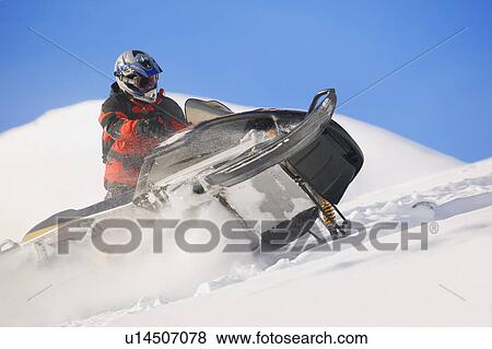 Stock Photo - A skidoo in action. Fotosearch