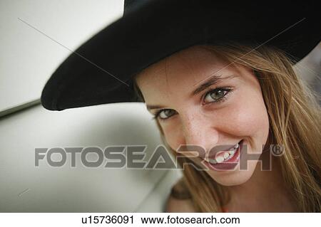 A smile and a hat View Large Photo Image Stock Image - A smile and a hat. Fotosearch