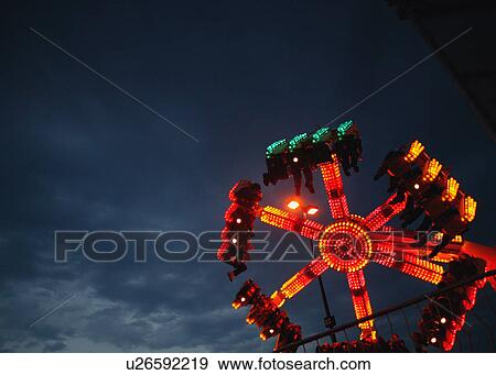 A spinning ride at an amusement park View Large Photo Image Stock Photo - A spinning ride at an amusement park. Fotosearch