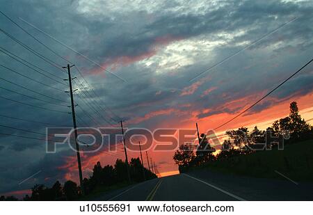 Stock Image - A sunrise/sunset. Fotosearch
