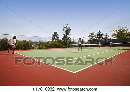 Stock Image - A tennis game. Fotosearch