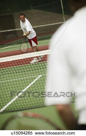 A tennis game View Large Photo Image Stock Photography - A tennis game. Fotosearch