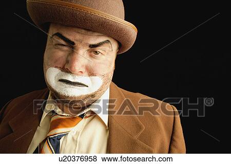 Stock Photo - A tired clown. Fotosearch