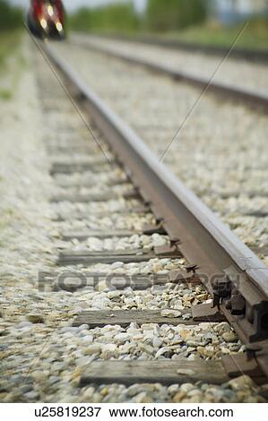 A train on tracks View Large Photo Image Stock Photo - A train on tracks. Fotosearch