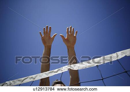 Picture - A volleyball block. Fotosearch