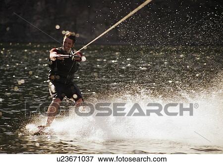 A wake boarder View Large Photo Image Stock Photo - A wake boarder. Fotosearch