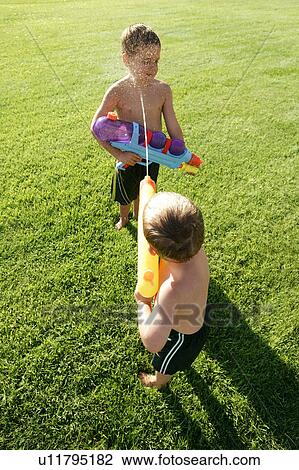 Stock Image - A water fight. Fotosearch