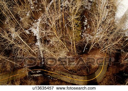 Aerial view of a country road View Large Photo Image Stock Photo - Aerial view of a country road. Fotosearch