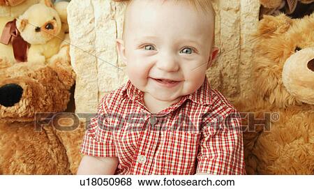 Stock Photo - Baby with special friends. Fotosearch