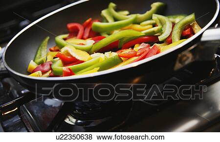 Bell peppers in pan View Large Photo Image Stock Photo - Bell peppers in pan. Fotosearch