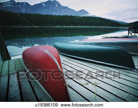 Boats on a dock View Large Photo Image Stock Photo - Boats on a dock. Fotosearch