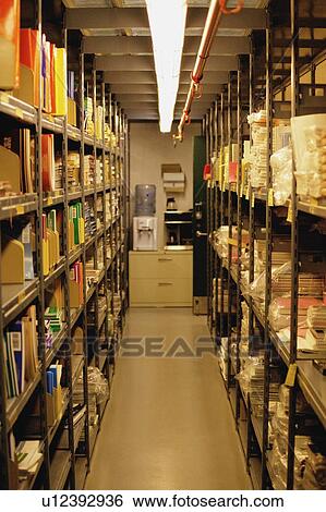 Stock Photograph - Books on shelves. Fotosearch