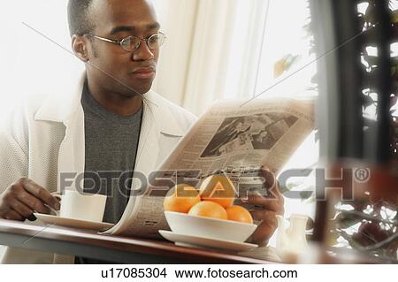 Breakfast newspaper View Large Photo Image Picture - Breakfast newspaper. Fotosearch