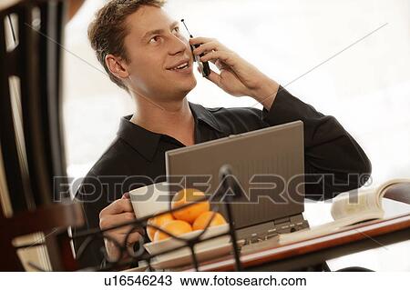 Stock Image - Breakfast work time. Fotosearch