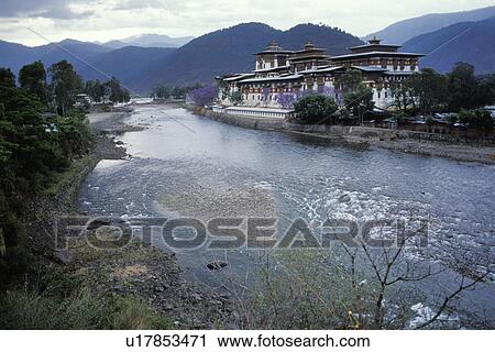 Building beside small body of water View Large Photo Image Stock Image - Building beside small body of water. Fotosearch