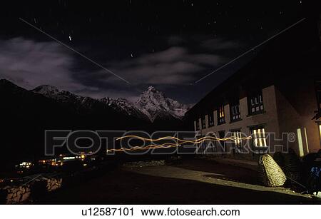 Building in the mountains at night View Large Photo Image Stock Image - Building in the mountains at night. Fotosearch