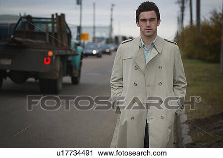 Business man on the side of the road View Large Photo Image Stock Image - Business man on the side of the road. Fotosearch