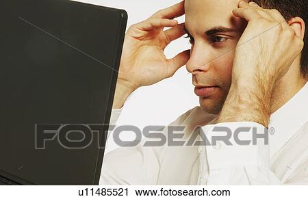 Stock Image - Businessman has stress. Fotosearch