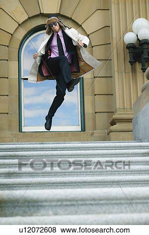 Stock Photo - Businessman leaps. Fotosearch
