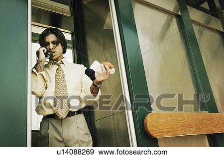 Stock Photo - Businessman on the phone. Fotosearch