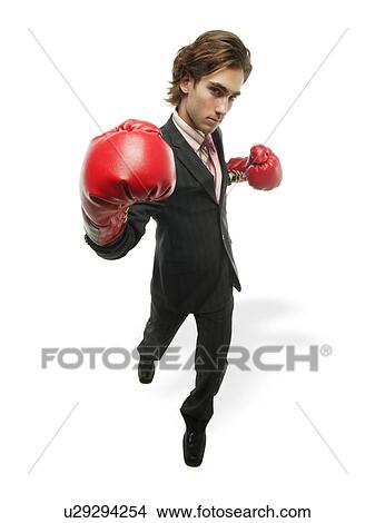 Businessman puts up a fight View Large Photo Image Picture - Businessman puts up a fight. Fotosearch