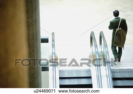 Businessman reaches the top View Large Photo Image Stock Image - Businessman reaches the top. Fotosearch