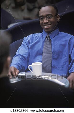 Businessman taking a break View Large Photo Image Stock Photograph - Businessman taking a break. Fotosearch