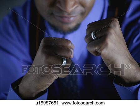 Businessman with fighter's stance View Large Photo Image Stock Image - Businessman with fighter's stance. Fotosearch