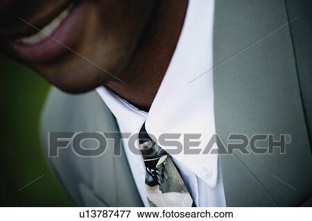 Stock Photo - Businessman's smile. Fotosearch