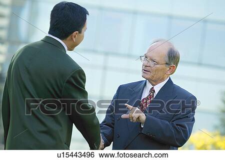Businessmen shake hands View Large Photo Image Stock Photograph - Businessmen shake hands. Fotosearch
